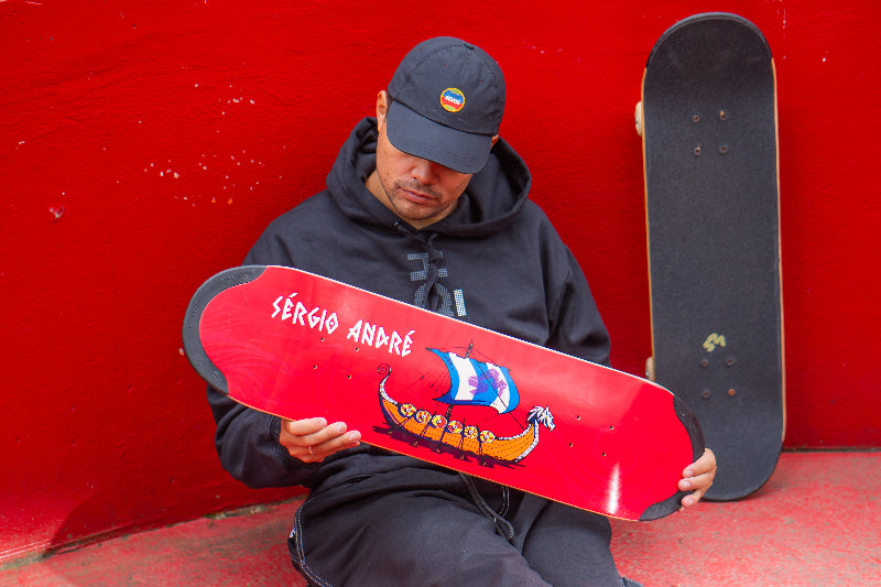 Pro Skater Sérgio André with his 4Msb Signature Skateboard Deck, boat collection Drakkar Sérgio André. Red deck with TIPtech for longer durability and better pop.