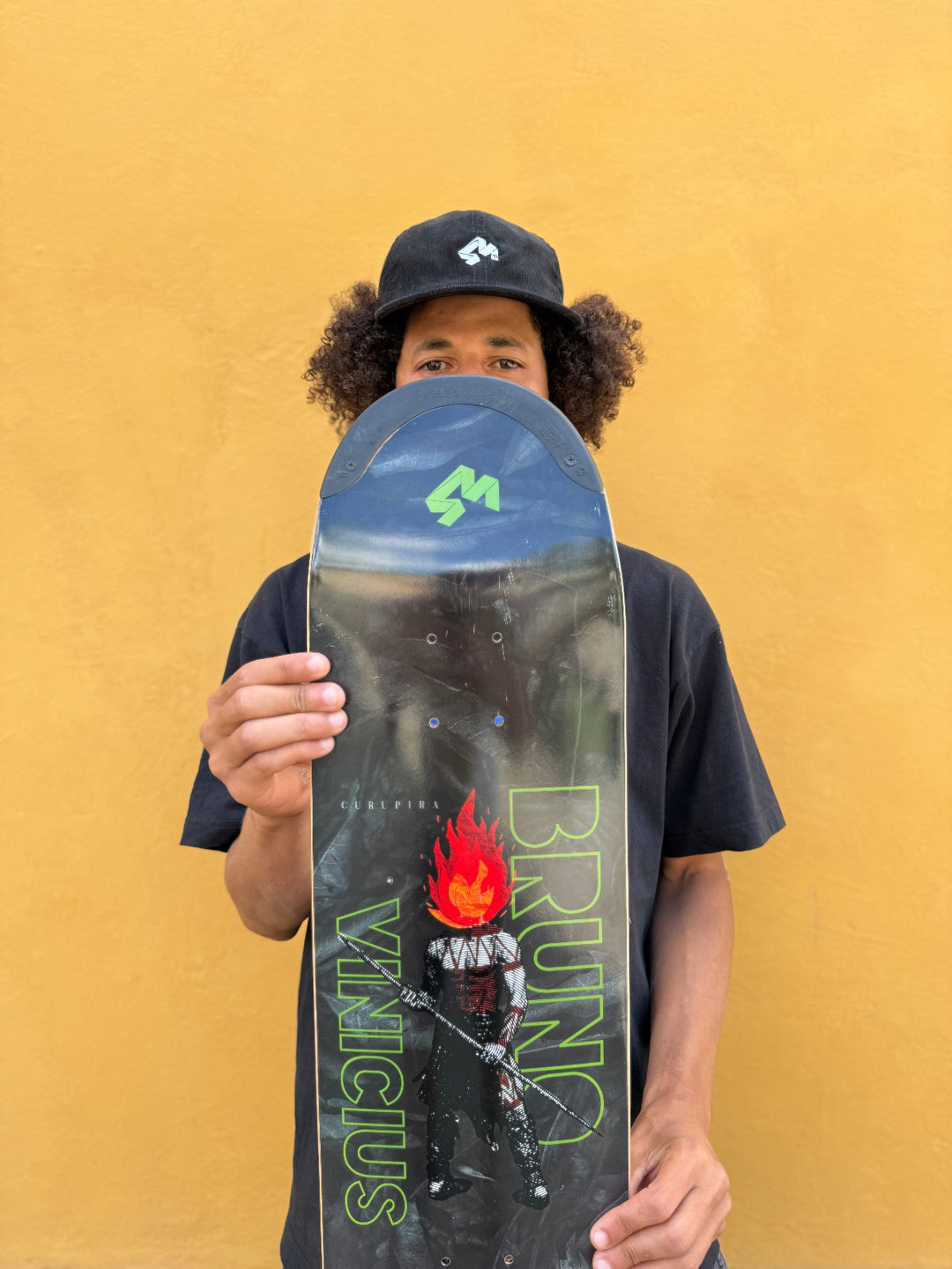 Pro skateboarder Bruno Vinicius with his first Pro model skateboard deck Curupira with TIPtech. The graphic shows Curupira with his red fire hair, the protecter of the rain forest and the animals, a Brazilian legend. 