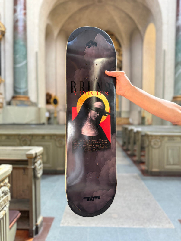 The 4Msb skateboard deck Saint Bridget, part of the saints collection, photographed in the Oscar church in Stockholm, Swedem. The deck has TIPtech and the graphic is dark grey with an image of Saint Bridget with the title Bruno Vinicius (4Msb pro skateboarder).