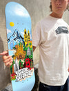 4Msb pro skateboarder Kilian Zehnder in white t-shirt holding his skateboard deck cities, pro model Kilian Zehnder. Colorful graphic of a cityscape with landmarks, trees and mountains on light blue background, showing Kilian Zehnder's four favorite cities: Barcelona, Sao Paulo, Zürich, San Francisco.
