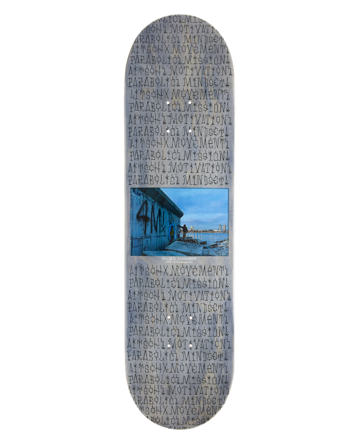 4Msb skateboard deck classic, kilian zehnder pro model. grey and blue graphic showing the rider kilian doing graffiti on a concrete wall by the sea in barcelona and personal text on the board including the words mission, mindset, movement, motivation, parabolic and aitsch
