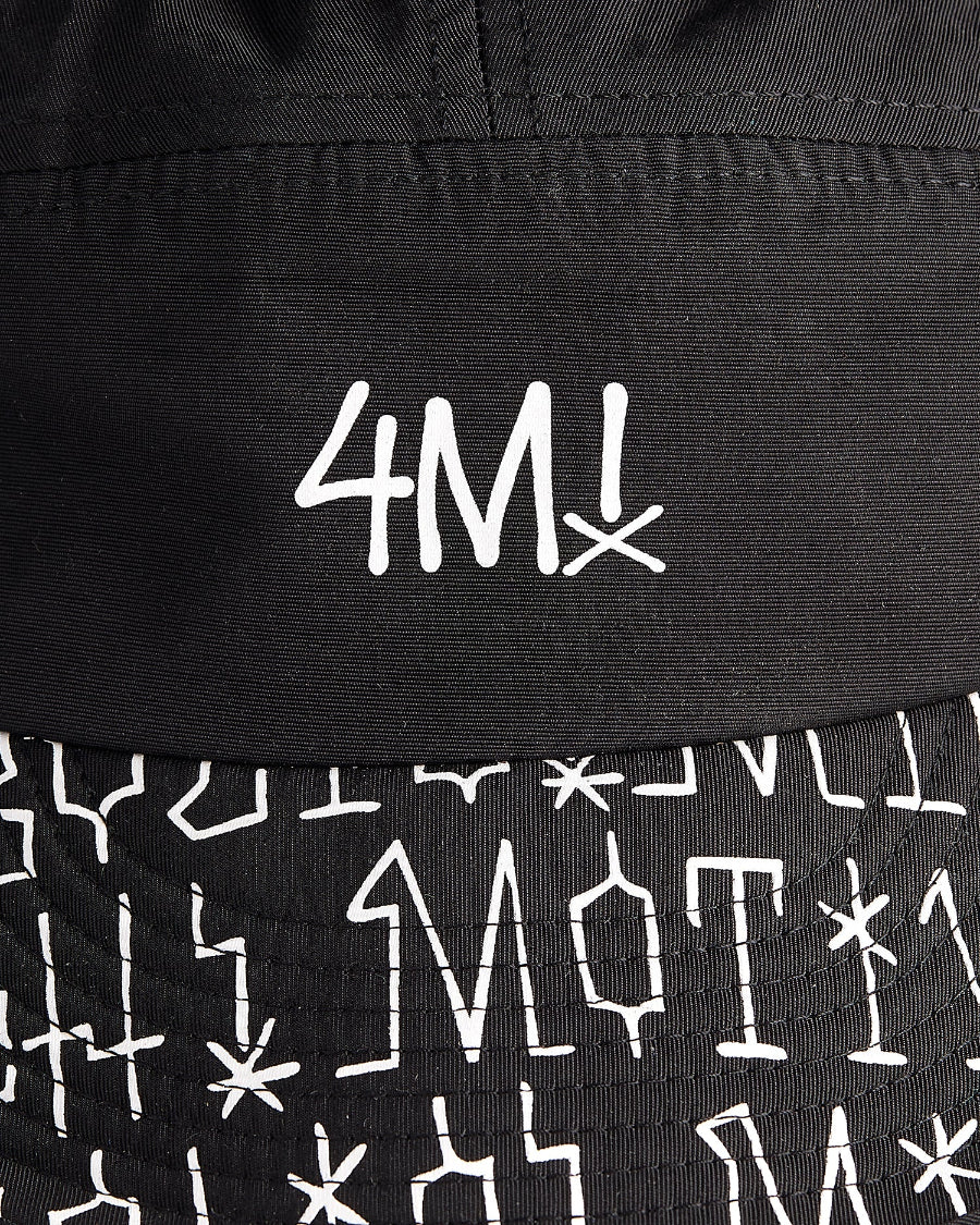 Close-up front and brim kilian zehnder skateboard cap graffiti with a white 4M-tag on the front and 4Msb-words on the brim.