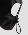 Black 4Msb skateboard cap Kilian Zehnder graffiti seen from the back, closeup of elastic cord adjustment with cord lock.