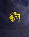 Close up on a the front of a navy blue dad cap with a yellow 4Msb logo with a yellow dala horse