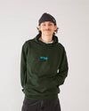 Skater wearing 4Msb fisherman beanie and 4Msb hoodie in the color forest green.