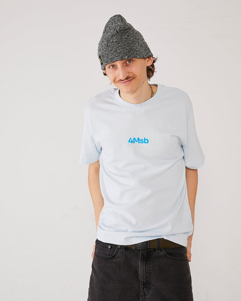 skater wearing a ice blue t-shirt with 4Msb logo and a grey skateovation SO cuffed beanie.