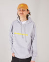 Skateboarder wearing a dad cap SO vintage mustard  and a skateovation hoodie core heather grey.