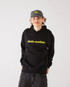 Skater wearing a dad cap in vintage black with SO logo in yellow and a black hoodie core with Skateovation texted in yellow.