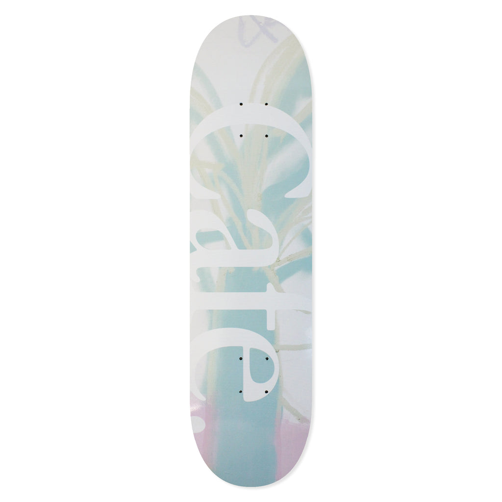 The Cafe Skateboard Deck JLH in Cream/Green, the deck graphic is are abstract pastel shades of green and cream with a large 'cafe' text on it.
