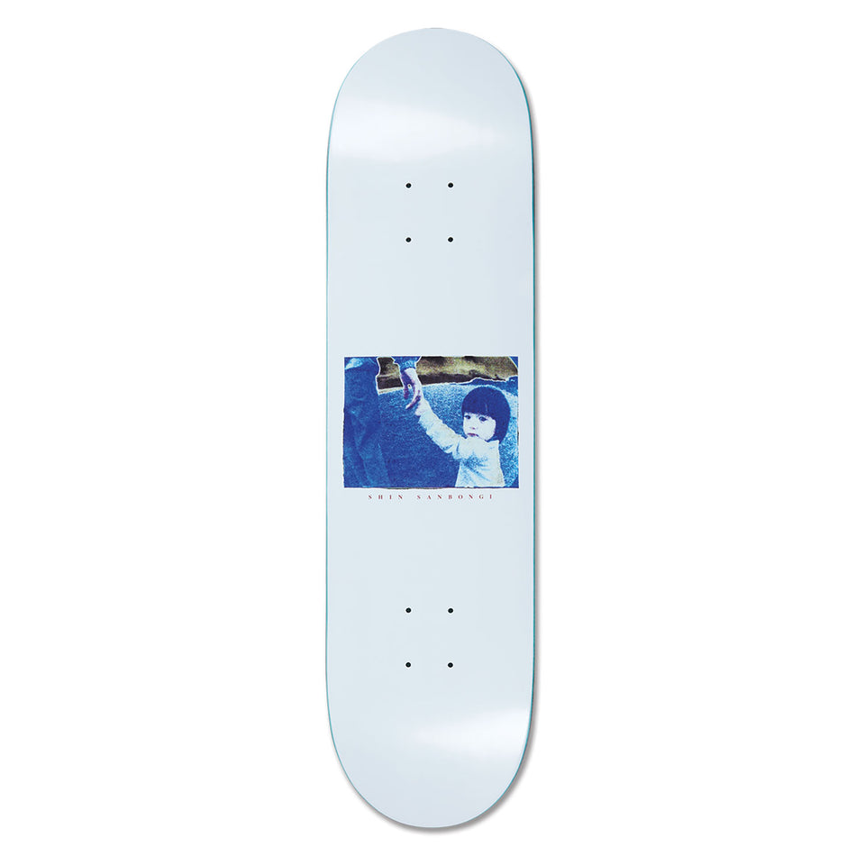 Polar Skateboard deck with a printed blue design in the middle, a child holding a hand, on a white background