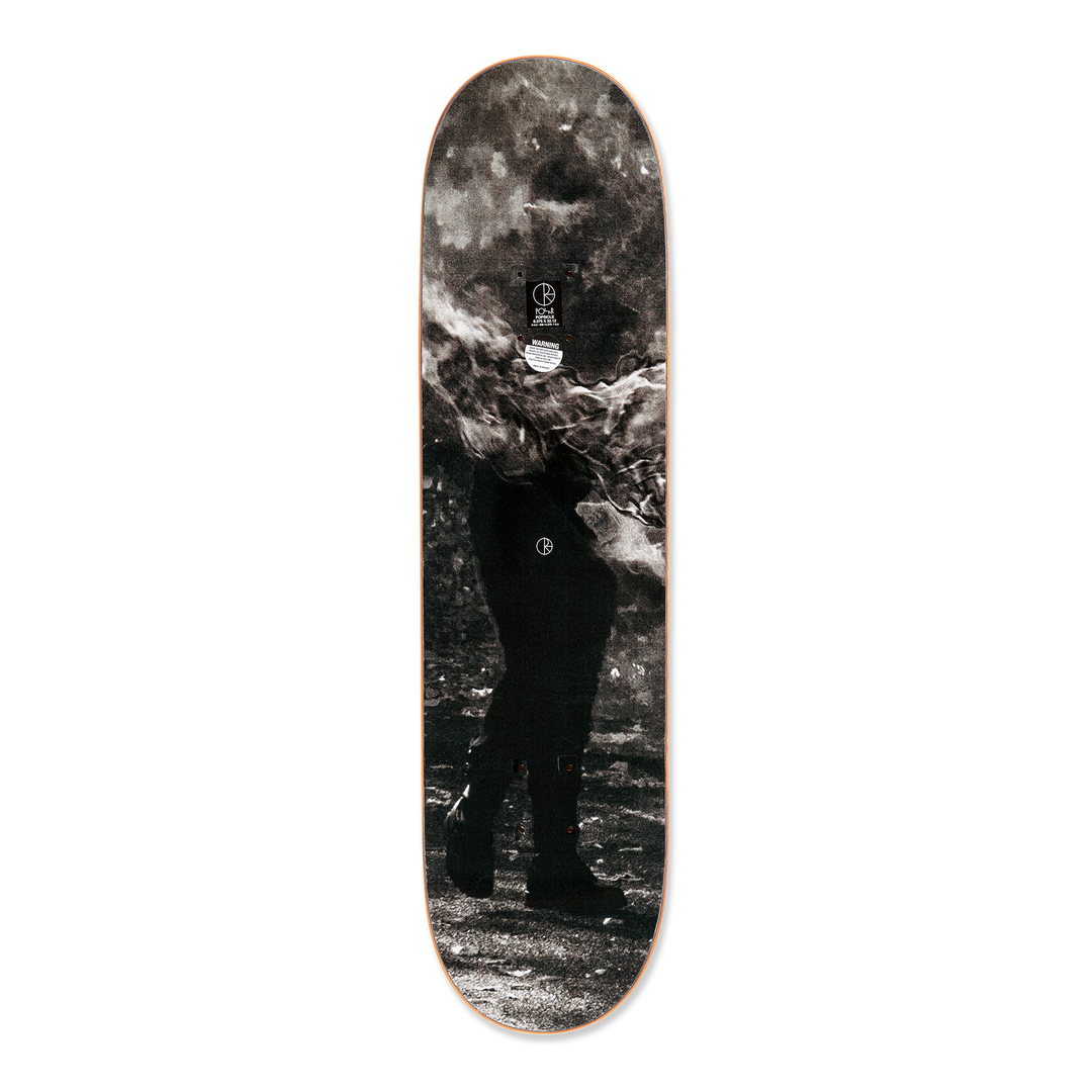 The Polar skateboard deck for pro rider Paul Grund, Stuntman B. The bottom graphic shows black and white images of a stuntman getting ready, the top graphic shows a stuntman on fire.