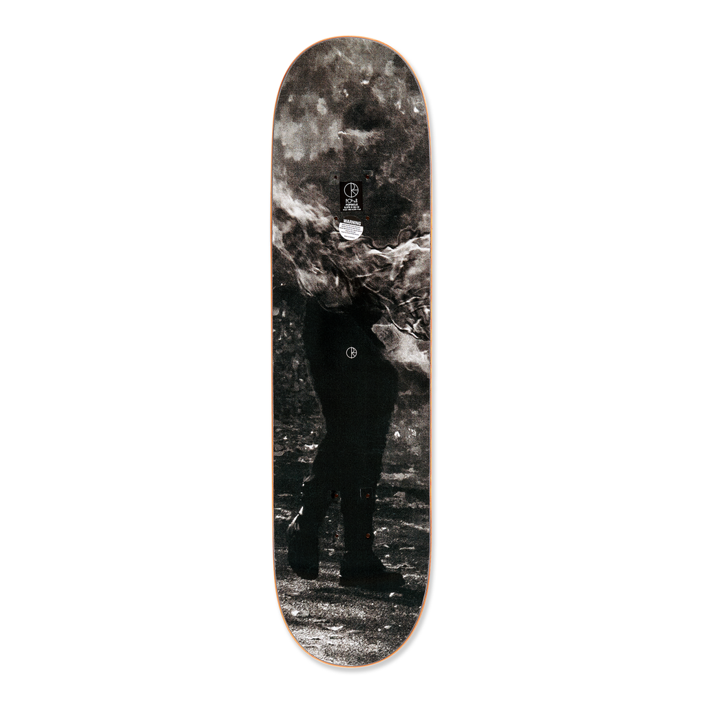 The Polar skateboard deck for pro rider Paul Grund, Stuntman B. The bottom graphic shows black and white images of a stuntman getting ready, the top graphic shows a stuntman on fire.