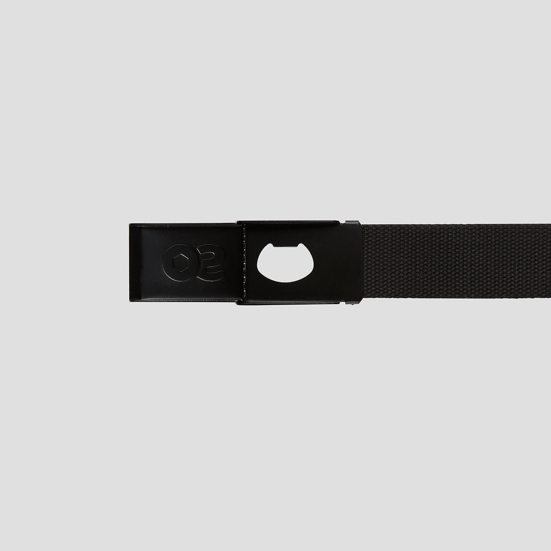 Skateovation webbing belt in black, showing the buckle is also a bottle opener.