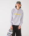 Skater wearing SO dad cap in vintage black with SO in yellow and a hoodie in the color heather grey with Skateovation texted in yellow.
