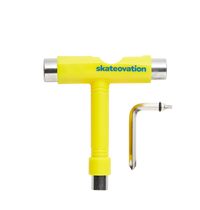A yellow Skateovation skateboard mounting tool with a Phillips key and an Allen key.