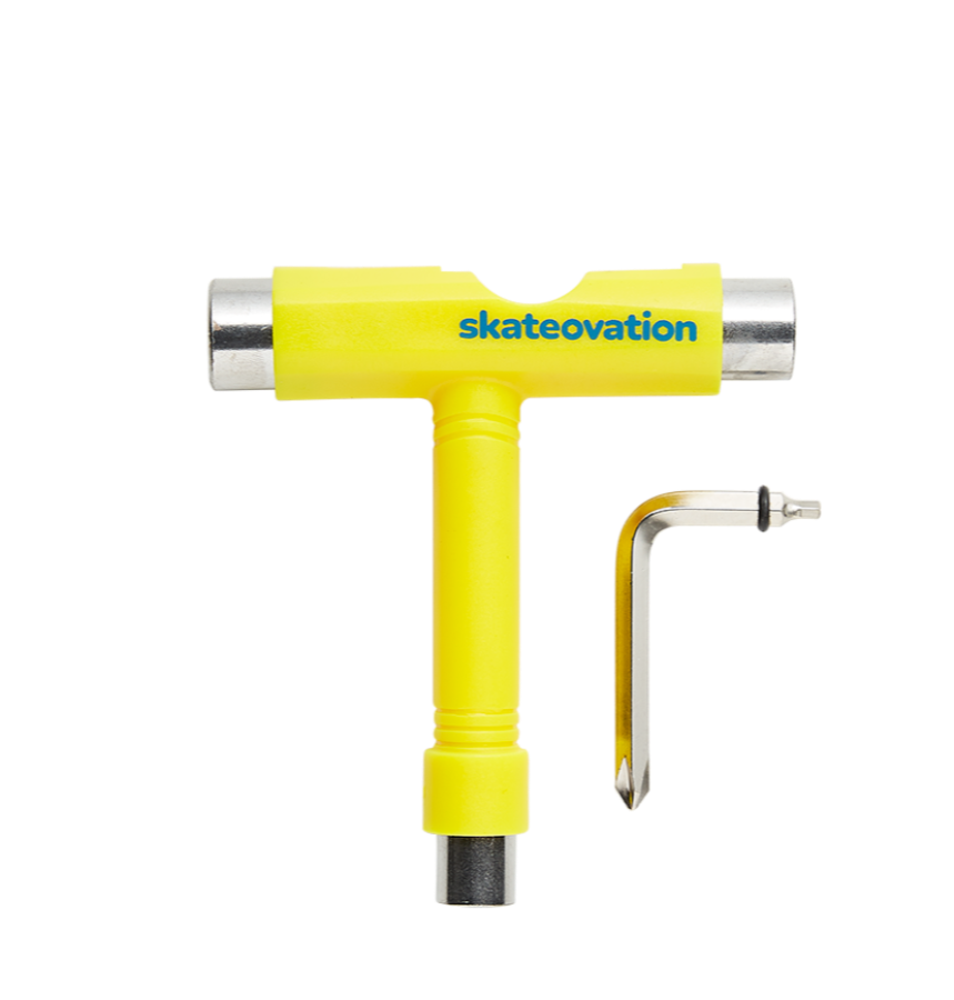 A yellow Skateovation skateboard mounting tool with a Phillips key and an Allen key.