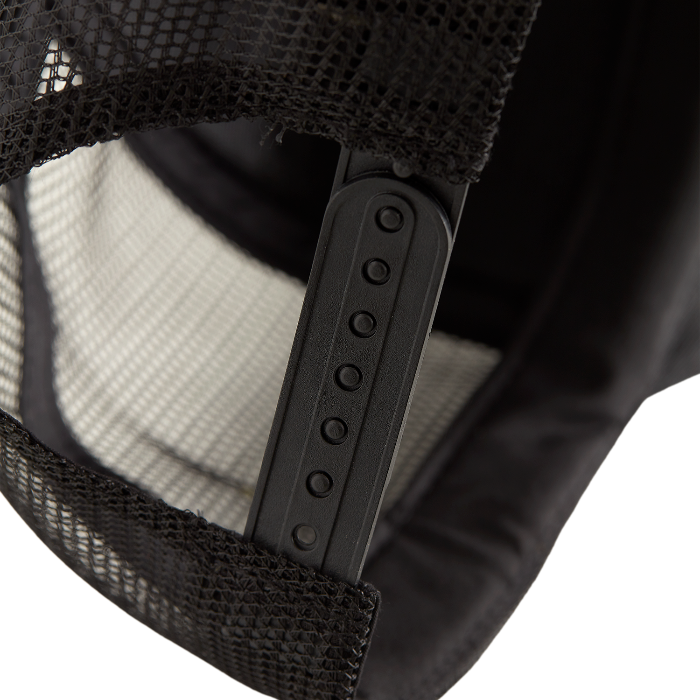 Close-up of a black mesh trucker cap with a strap.